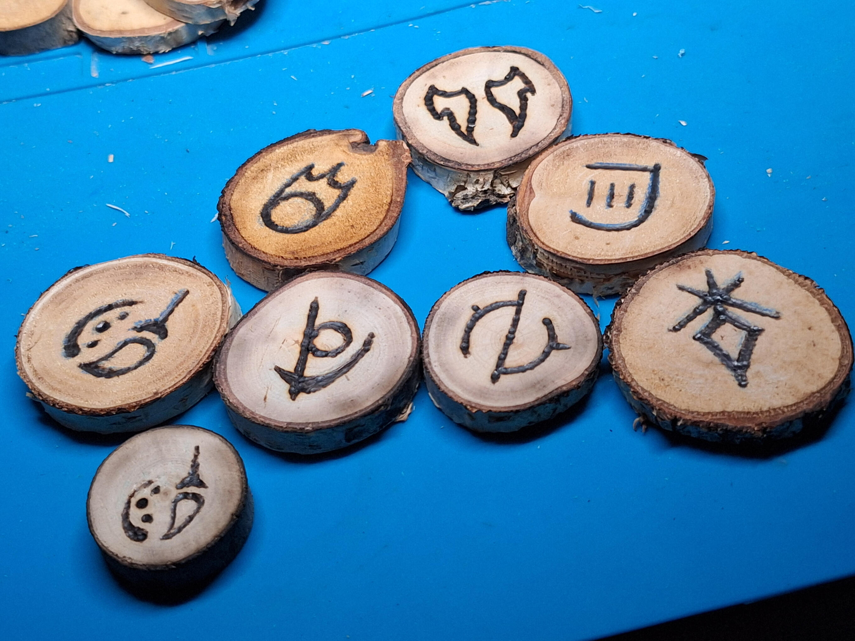 FFXIV Job Symbols burned on Wood Slices